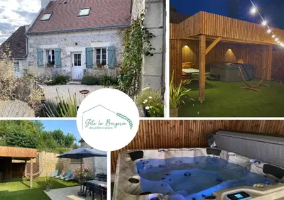 Jardin de l'établissement La bergerie des petites maisons avec spa