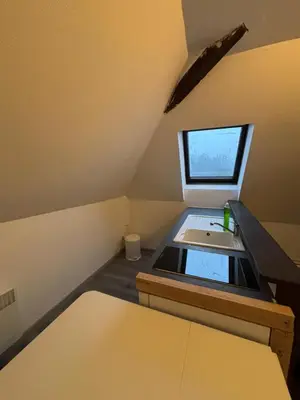 Un ou plusieurs lits dans un hébergement de l'établissement Appartement Numéro 3, centre chateau-renault