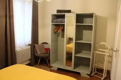 Un ou plusieurs lits dans un hébergement de l'établissement Charmante maison à la campagne