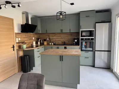 Cuisine ou kitchenette dans l'établissement Grande maison familiale & conviviale