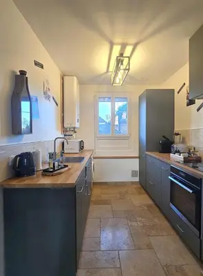 Cuisine ou kitchenette dans l'établissement Le 7e art * home cinéma * centre-ville * Netflix
