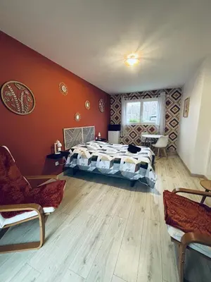 Un ou plusieurs lits dans un hébergement de l'établissement Chambre d'hôte à la campagne