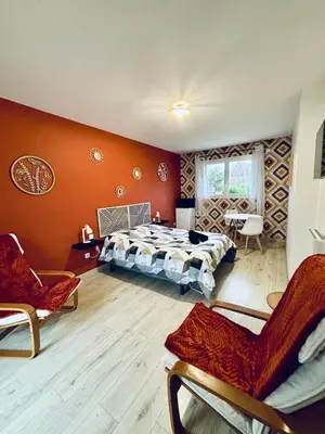 Un ou plusieurs lits dans un hébergement de l'établissement Chambre d'hôte à la campagne