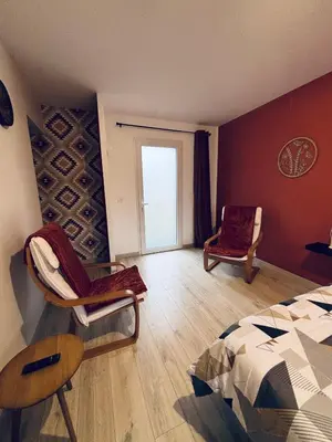 Coin salon dans l'établissement Chambre d'hôte à la campagne