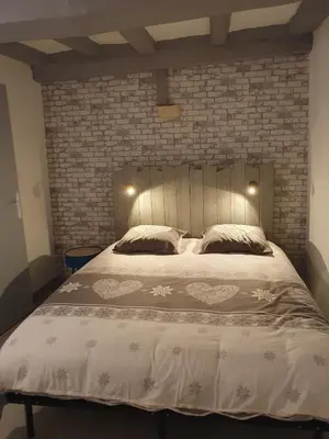 Un ou plusieurs lits dans un hébergement de l'établissement Appartement