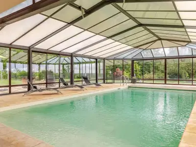 Piscine de l'établissement Maison d'architecte avec piscine chauffée et parc sécurisé - FR-1-410-487 ou située à proximité