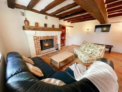 Coin salon dans l'établissement Gîte confortable avec WIFI, parking, climatisation en Touraine - FR-1-381-644