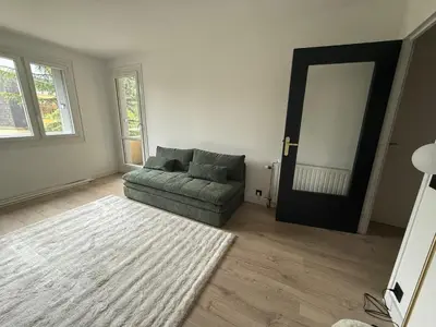 Coin salon dans l'établissement Appartement 24h - Le Mans