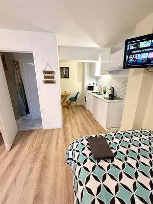 Cuisine ou kitchenette dans l'établissement Studio Coconia RDC - Proche Centre & Gare - WiFi