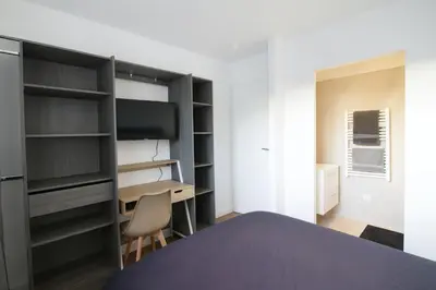 Un ou plusieurs lits dans un hébergement de l'établissement House with 9 Private Suites near Le Mans Circuit