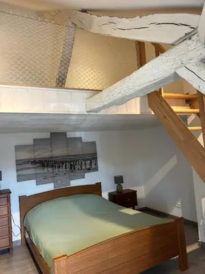 Un ou plusieurs lits dans un hébergement de l'établissement Maison de Ville Isabella 1