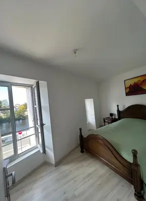 Un ou plusieurs lits dans un hébergement de l'établissement Maison de Ville Isabella 1