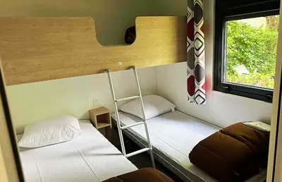 Un ou plusieurs lits dans un hébergement de l'établissement Mobile home Prestige 2 chambres 5-7 personnes