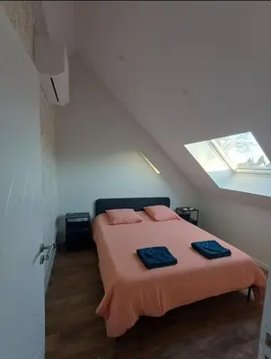 Un ou plusieurs lits dans un hébergement de l'établissement Gîte Gui's de 1 à 5 personnes avec piscine