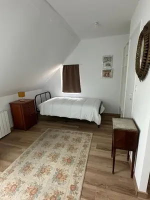 Un ou plusieurs lits dans un hébergement de l'établissement Le Cottage