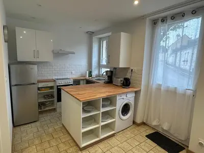 Cuisine ou kitchenette dans l'établissement Le Cottage