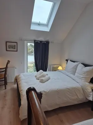 Un ou plusieurs lits dans un hébergement de l'établissement Maison de la Croix Verte - Gite 13 personnes a Chambourg