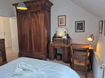 Un ou plusieurs lits dans un hébergement de l'établissement Maison de la Croix Verte - Gite 13 personnes a Chambourg