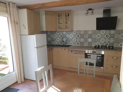 Cuisine ou kitchenette dans l'établissement Le Gîte du Noyer