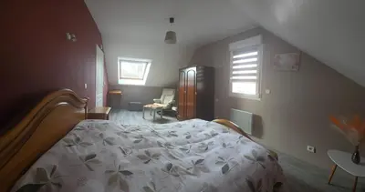 Un ou plusieurs lits dans un hébergement de l'établissement Chez Jackymartine