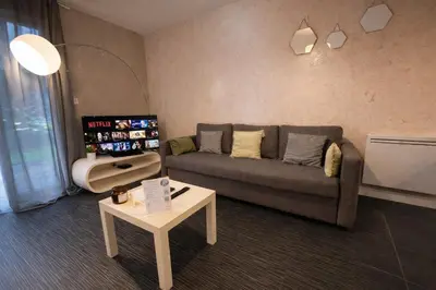 Coin salon dans l'établissement Appartement Lumineux -Hôpital Bretonneau