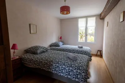 Un ou plusieurs lits dans un hébergement de l'établissement Domaine de la Chesnaie - Piscine couverte