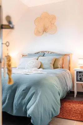 Un ou plusieurs lits dans un hébergement de l'établissement Le Logis 87m2 - Maison lumineuse près de Blois
