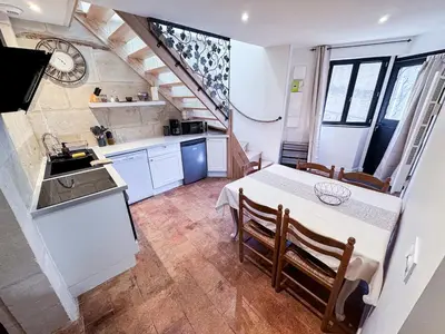 Cuisine ou kitchenette dans l'établissement La Maisonnette de Carreaux
