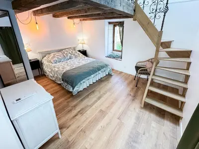 Un ou plusieurs lits dans un hébergement de l'établissement La Maisonnette de Carreaux