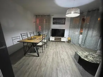 Télévision ou salle de divertissement dans l'établissement L'appart du Château