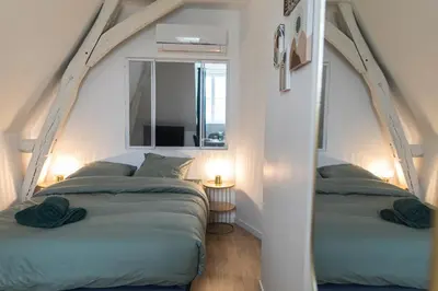 Un ou plusieurs lits dans un hébergement de l'établissement Le Clos Hérault Châtellerault Centre-Gare