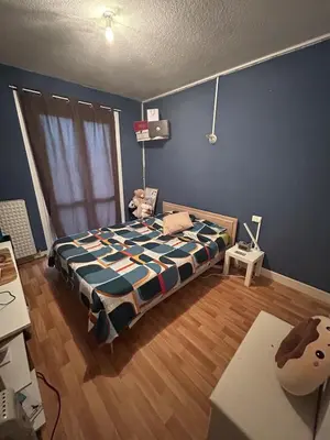 Un ou plusieurs lits dans un hébergement de l'établissement Appartement lumineux,3 chambres,proche de la gare