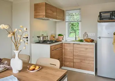 Cuisine ou kitchenette dans l'établissement Camping la Vallée des Vignes - Aquatique Vacances