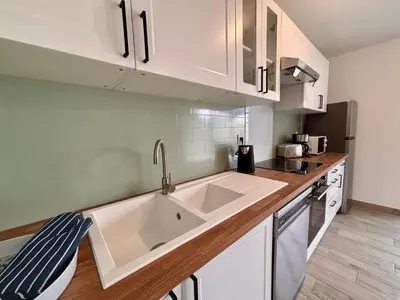 Cuisine ou kitchenette dans l'établissement Maison Verde - Maison moderne cozy avec extérieur