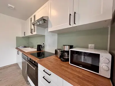 Cuisine ou kitchenette dans l'établissement Maison Verde - Maison moderne cozy avec extérieur