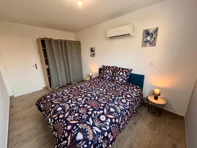 Un ou plusieurs lits dans un hébergement de l'établissement Maison Verde - Maison moderne cozy avec extérieur