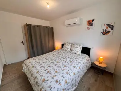 Un ou plusieurs lits dans un hébergement de l'établissement Maison Mocca - Maison moderne cozy avec extérieur