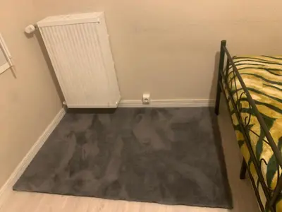 Un ou plusieurs lits dans un hébergement de l'établissement Chambre meublée et lumineuse Centre de Tours