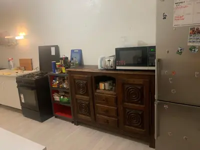 Cuisine ou kitchenette dans l'établissement Chambre meublée et lumineuse Centre de Tours