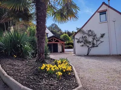 Jardin de l'établissement Grande maison familiale avec piscine chauffée