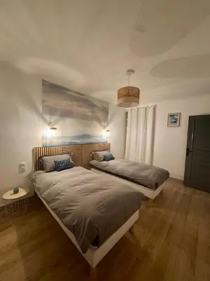 Un ou plusieurs lits dans un hébergement de l'établissement Maison spacieuse pour 6 personnes