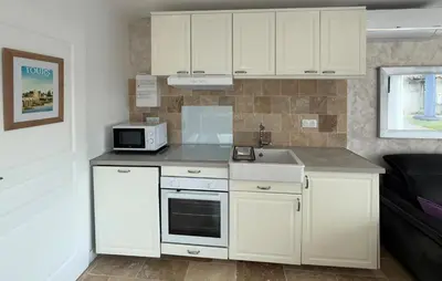 Cuisine ou kitchenette dans l'établissement Studio Tout Confort