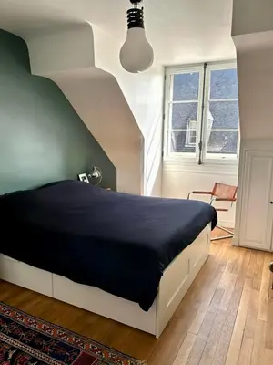 Un ou plusieurs lits dans un hébergement de l'établissement Appartement vue sur Loire