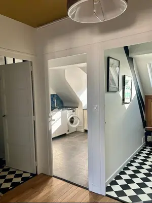 Un ou plusieurs lits dans un hébergement de l'établissement Appartement vue sur Loire
