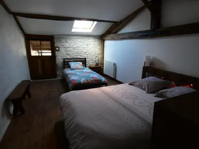 Un ou plusieurs lits dans un hébergement de l'établissement Gîte Val de Loire Le Puits