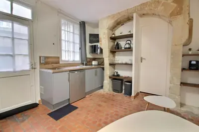 Cuisine ou kitchenette dans l'établissement Le Colbert calme WIFI Hypercentre