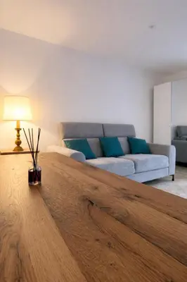 Coin salon dans l'établissement Les 2 Tilleuls - Maison de charme avec jardin