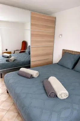 Un ou plusieurs lits dans un hébergement de l'établissement Les 2 Tilleuls - Maison de charme avec jardin