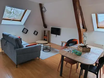 Télévision ou salle de divertissement dans l'établissement Le calme de montaupin