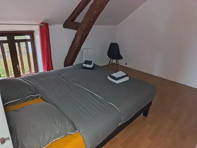 Un ou plusieurs lits dans un hébergement de l'établissement Le calme de montaupin